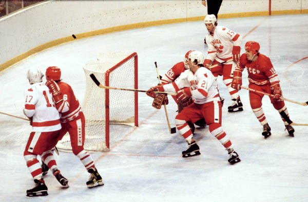 Canada's Paul McLean (17), Kevin Primeau (21), and John Devaney (15) compete in hockey action against the U.S.S.R. at the 1980 Winter Olympics in Lake Placid. (CP Photo/ COA)