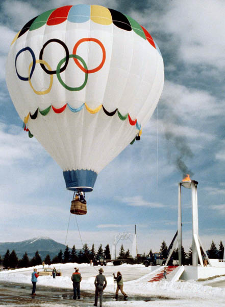 A hot air balloon depicting the Olympic rings floats over the opening ceremonies of the 1980 Winter Olympics in Lake Placid. (CP PHOTO/COA)