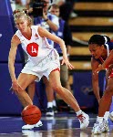Canada's Michelle Hendry (left) participates in basketball action at the Sydney 2000 Olympic Games. (CP PHOTO/ COA)