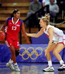 Canada's Michelle Hendry (left) participates in basketball action at the Sydney 2000 Olympic Games. (CP PHOTO/ COA)