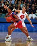 Canada's Dianne Norman (left) defends her zone during basketball action at the Sydney 2000 Olympic Games. (CP PHOTO/ COA)