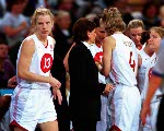 Canada's Tammy Sutton-Brown (behind) guards the basket during basketball action at the Sydney 2000 Olympic Games. (CP PHOTO/ COA)