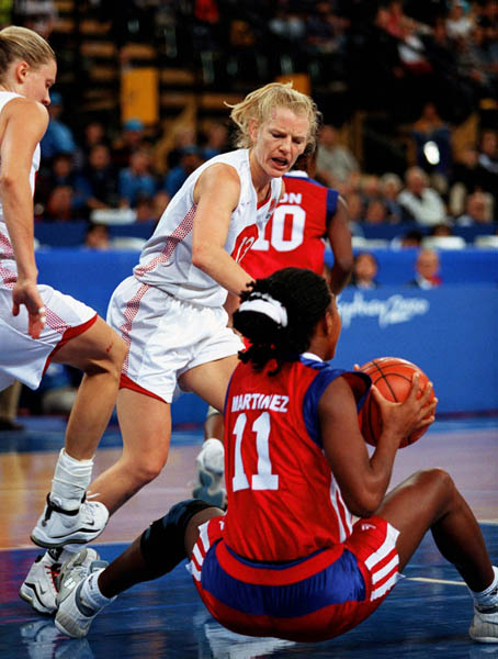 Canada's Kelly Boucher (left) participates in basketball action at the Sydney 2000 Olympic Games. (CP PHOTO/ COA)