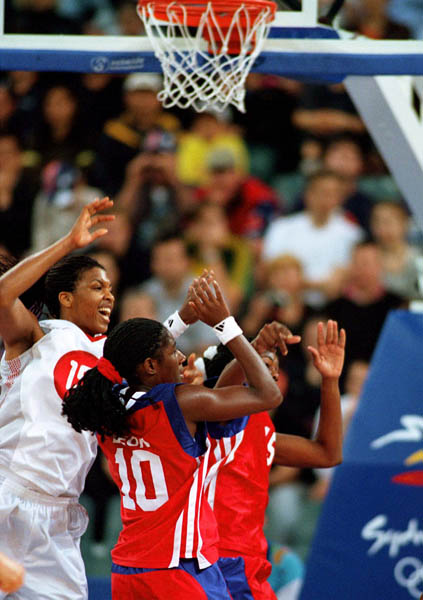 Canada's Tammy Sutton-Brown (left) participates in basketball action at the Sydney 2000 Olympic Games. (CP PHOTO/ COA)