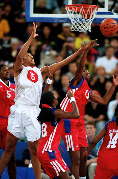 Canada's Tammy Sutton-Brown (15) reaches for the ball during basketball action at the Sydney 2000 Olympic Games. (CP PHOTO/ COA)