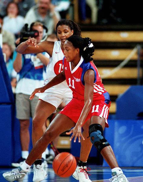 Canada's Tammy Sutton-Brown (left) defends her zone during basketball action at the Sydney 2000 Olympic Games. (CP PHOTO/ COA)
