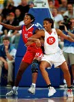 Canada's Tammy Sutton-Brown (15) jumps for a shot as teammate Dianne Norman (11) looks on during basketball action at the Sydney 2000 Olympic Games. (CP PHOTO/ COA)