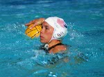 Canada's water polo player Ann Dow (#9) waits for a pass in the game against Russia at the Olympic Games in Athens on August 16, 2004. (CP PHOTO 2004/Andre Forget/COC)
