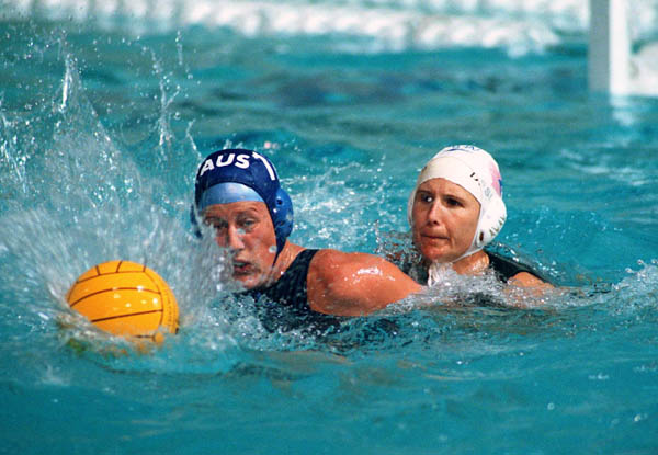 Canada's  Marie-Claude Deslieres (right) participates in women's waterpolo preliminary action at the 2000 Sydney Olympic Games. (CP Photo/COA)