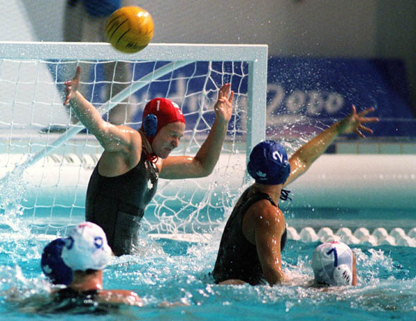 Canada's net minder Josee Marsolais makes a save during women's waterpolo preliminary action at the 2000 Sydney Olympic Games. (CP Photo/COA)
