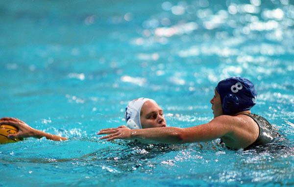 Canada's Melissa Collins (right) participates in women's waterpolo preliminary action at the 2000 Sydney Olympic Games. (CP Photo/COA)