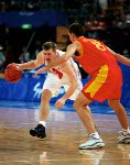 Canada's David Daniels (left) makes a pass during basketball action at the 2000 Sydney Olympic Games. (CP Photo/ COA)