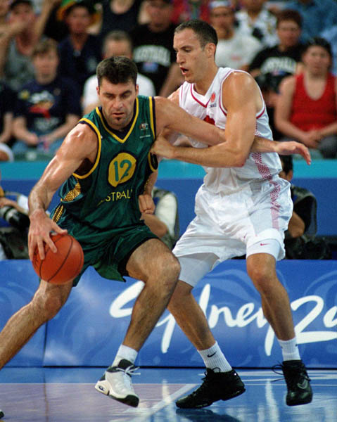 Canada's Pete Guarasci (right) plays basketball against Australia at the 2000 Sydney Olympic Games. (CP Photo/ COA)