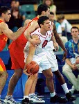 Canada's Eric Hinrichsen (right) participates in basketball action at the 2000 Sydney Olympic Games. (CP Photo/ COA)