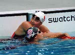 Canada's Christin Petelski watches for her swim time at the 2000 Sydney Olympic Games. (CP Photo/ COA)