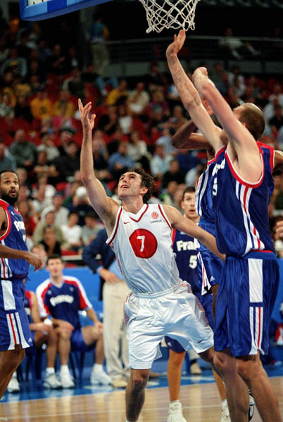 Canada's Steve Nash (7) makes a shot during basketball action at the 2000 Sydney Olympic Games. (CP Photo/ COA)