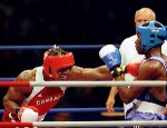 Canada's Troy Amos throws a punch during a boxing match at the Sydney 2000 Olympic Games. (CP PHOTO/ COA)