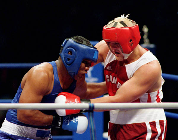 Canada's Artur Binkowski competes in the boxing event of the 2000 Sydney Olympic Games. (CP Photo/ COA)