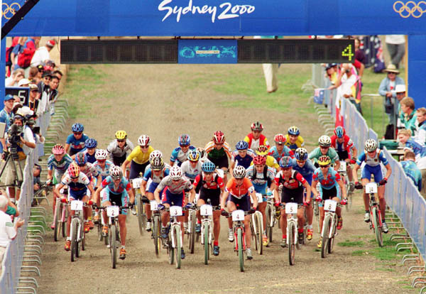 Canada's Chrissy Redden (8) and Alison Sydor (2) compete in a cross country cycling race at the 2000 Sydney Olympic Games. (CP PHOTO/ COA)