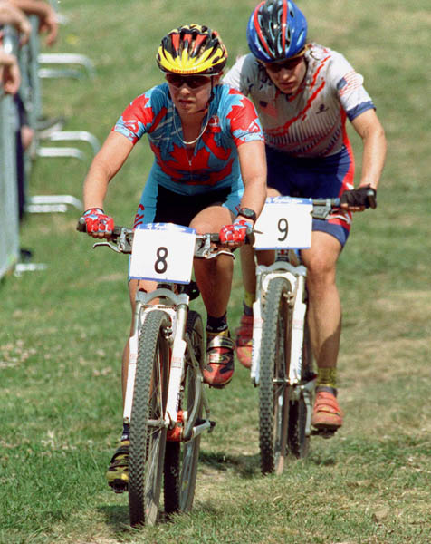 Canada's Chrissy Redden (8) competes in a cross country cycling event at the 2000 Sydney Olympic Games. (CP PHOTO/ COA)