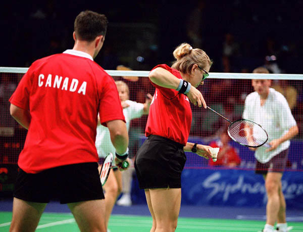 Canada's Milaine Cloutier and Bryan Moody compete in the mixed doubles badminton event at the 2000 Sydney Olympic Games. (CP Photo/ COA)