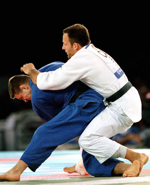 Canada's Keith Morgan (right) competes in the Judo event of the 2000 Sydney Olympic Games. (CP PHOTO/ COA)