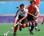 Canada's Rob Short (right) plays field hockey at the 2000 Sydney Olympic Games. (CP Photo/ COA)