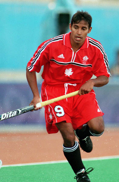 Canada's Ken Pereira plays field hockey at the 2000 Sydney Olympic Games. (CP Photo/ COA)