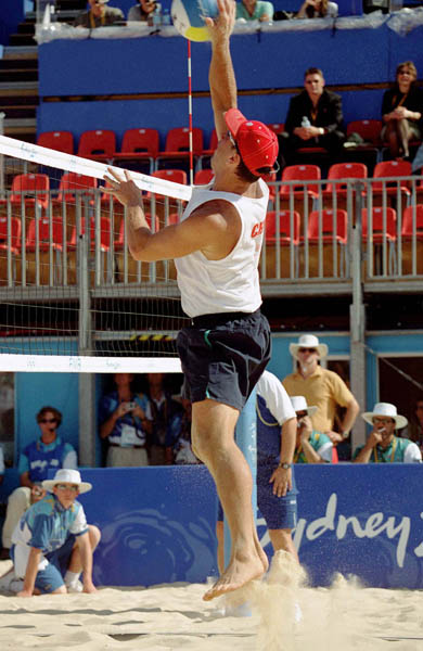 Canada's John Child plays a set of beach volleyball at the 2000 Sydney Olympic Games. (CP Photo/ COA)