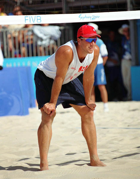Canada's John Child plays a set of beach volleyball at the 2000 Sydney Olympic Games. (CP Photo/ COA)