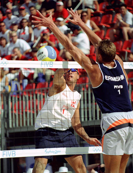 Canada's John Child (left) plays a set of beach volleyball at the 2000 Sydney Olympic Games. (CP Photo/ COA)