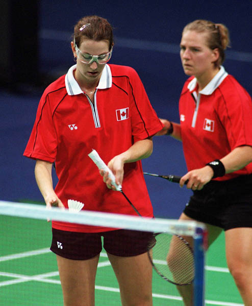 Canada's Milaine Cloutier (right) and Robbyn Hermitage compete in the women's doubles badminton event at the 2000 Sydney Olympic Games. (CP Photo/ COA)
