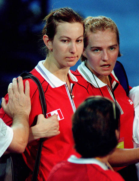 Canada's Robbyn Hermitage (left) and Milaine Cloutier (right) compete in the women's doubles badminton event at the 2000 Sydney Olympic Games. (CP Photo/ COA)