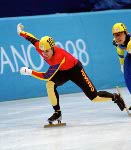 Canada's Eric Bedard (left) celebrates after winning the bronze medal in the short track speed skating event at the 1998 Nagano Olympic Games. (CP Photo/ COA)