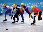 Canada's Eric Bedard (centre) competes in the short track speed skating event at the 1998 Nagano Winter Olympic Games. (CP Photo/ COA/ Scott Grant)