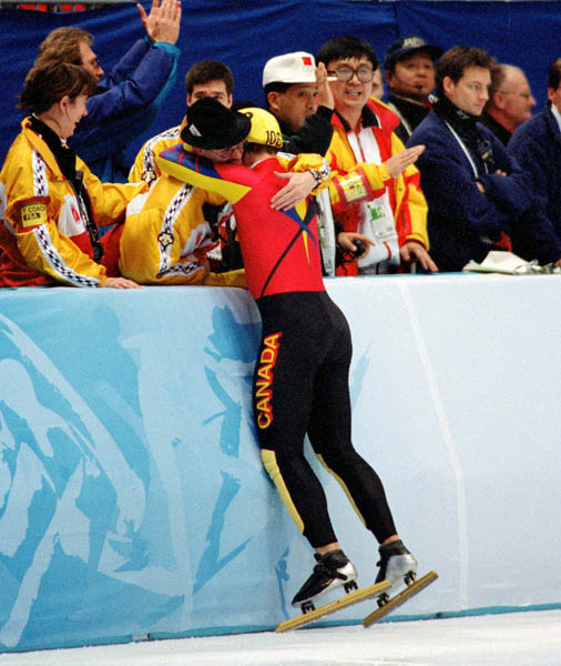 Canada's Eric Bedard celebrates after winning the bronze medal in the short track speed skating event at the 1998 Nagano Olympic Games. (CP Photo/ COA)