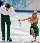 Canadians Shae-Lynn Bourne and Victor Kraatz are all smiles as they skate during their Ice Dancing Original Dance in Salt Lake City Sunday Feb. 17, at the 2002 Winter Olympic Games.  (CP Photo/COA/Andre Forget)