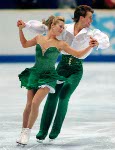 Canadians Shae-Lynn Bourne and Victor Kraatz are all smiles as they skate during their Ice Dancing Original Dance in Salt Lake City Sunday Feb. 17, at the 2002 Winter Olympic Games.  (CP Photo/COA/Andre Forget)