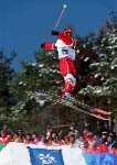 Canada's Andy Capicik (left) and Tammy Bradley exchange words during aerials at the freestyle ski event at the 1998 Nagano Winter Olympic Games. (CP Photo/ COA/Mike Ridewood)
