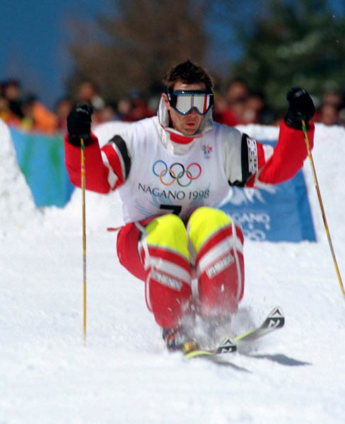 Canada's Jean-Luc Brassard competes in the speeds though moguls during the freestyle ski event at the 1998 Nagano Winter Olympic Games. (CP Photo/ COA/Mike Ridewood)