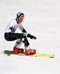 Canada's Darren Chalmers competes in the snowboard event at the 1998 Nagano Olympic Games. (CP Photo/ COA/Mike Ridewood)
