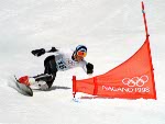 Canada's Darren Chalmers competes in the snowboard event at the 1998 Nagano Olympic Games. (CP Photo/ COA/Mike Ridewood)