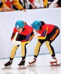 Canada's Isabelle Charest and Christine Boudrias compete in the short track speed skating relay event at the 1998 Nagano Winter Olympic Games. (CP Photo/ COA/ Scott Grant)