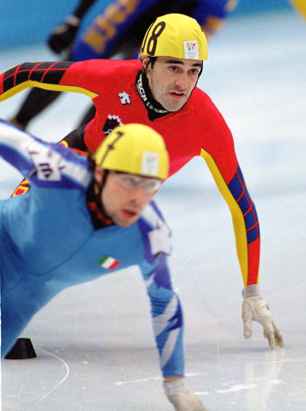Canada's Francois Drolet (back) competes in the short track speed skating event at the 1998 Nagano Winter Olympic Games. (CP Photo/ COA/ Scott Grant)