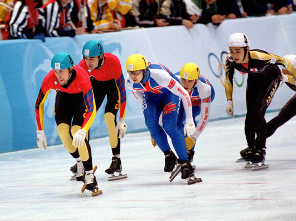 Canada's Marc Gagnon (4) and Francois Drolet (3) compete in the short track relay speed skating event at the 1998 Nagano Winter Olympic Games. (CP Photo/ COA/ Scott Grant)