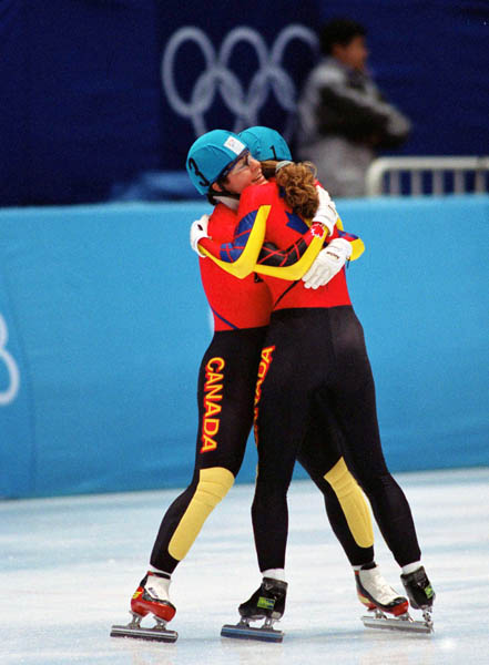 Canada's Christine Boudrias and Annie Perreault participate in the short track speed skating event at the 1998 Nagano Winter Olympic Games. (CP Photo/ COA/ Scott Grant)