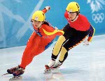 Canada's Annie Perreault celebrates after winning the gold medal in the women's short track speed skating event at the 1998 Nagano Winter Olympics. (CP PHOTO/COA/Scott Grant)