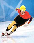 Canadian long-track speed skater Eric Brisson races during his 500-metre heat in Salt Lake City, Utah Tuesday Feb. 12, at the 2002 Olympic Winter Games. (CP Photo/COA/Andre Forget).