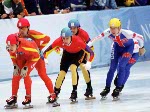 Canada's Eric Bedard (right) competes in the short track speed skating event at the 1998 Nagano Winter Olympic Games. (CP Photo/ COA/ Scott Grant)