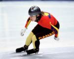 La patineuse de vitesse Susan Auch du Canada discute avec l'entraneur Derek Auch aux Jeux olympiques d'hiver de Nagano de 1998. (Photo PC/AOC)